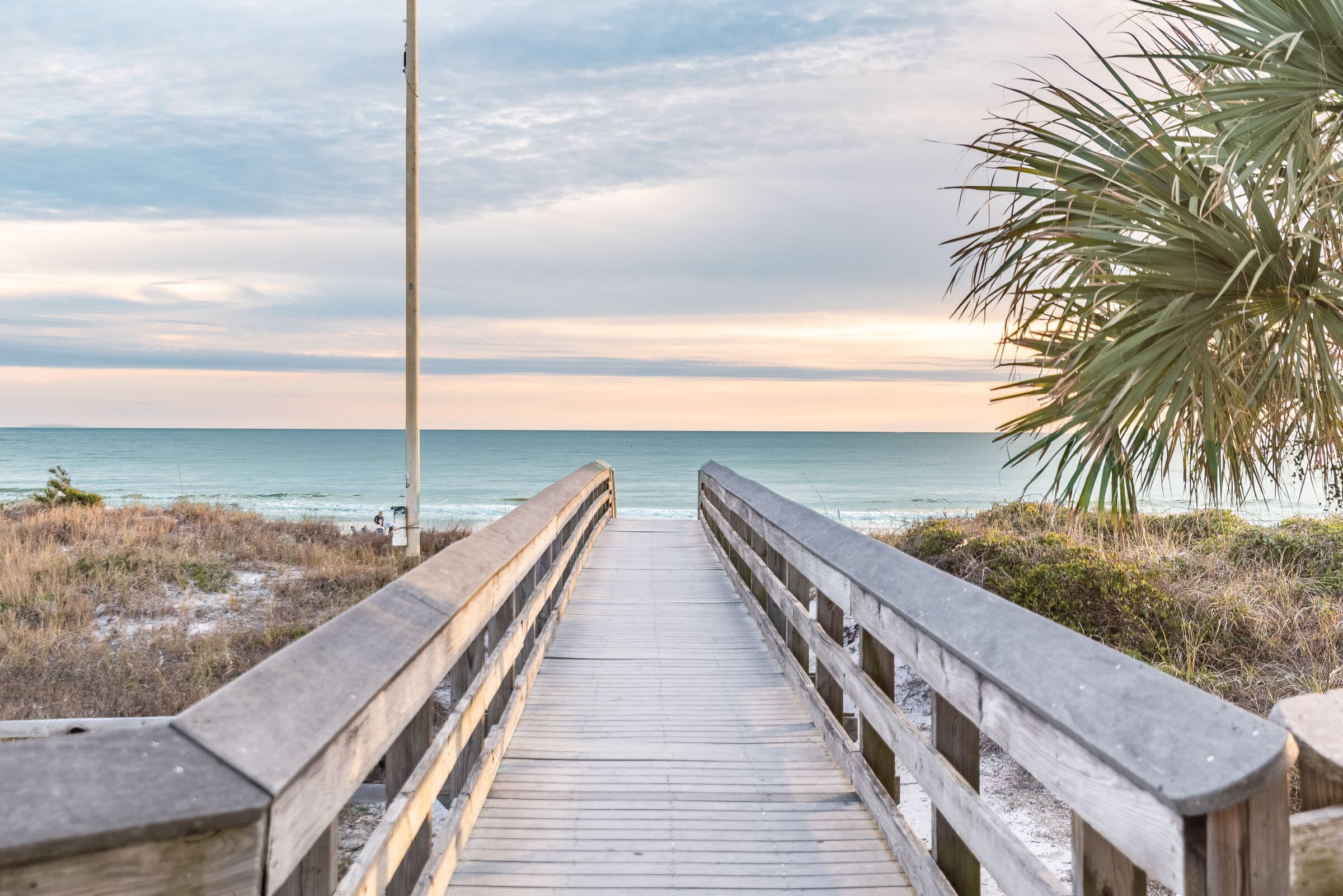 Boardwalk over the dunes to the Gulf at sunset in Dune Allen